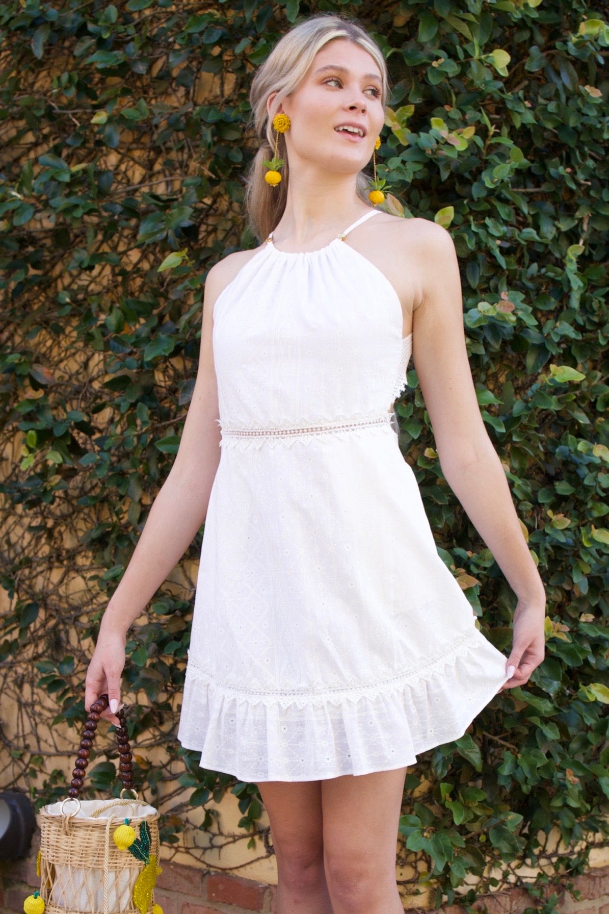 100% cotton dress with guipure detailing, lined for comfort, and a flowing hem