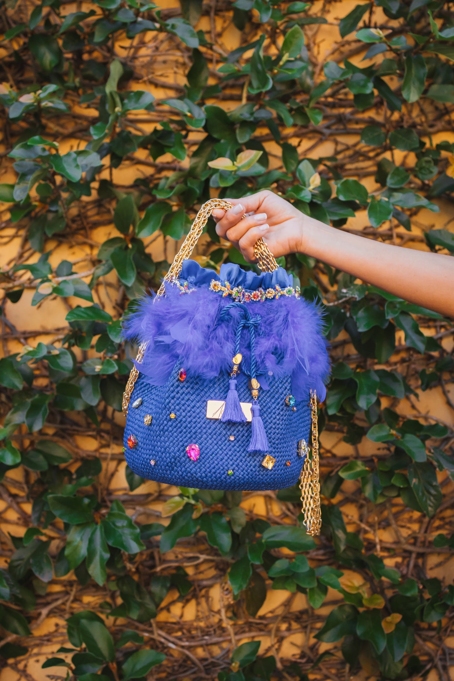 Ella Straw Bucket Bag with crystal detailing and 18k gold hardware, made from 100% Iraca palm,
